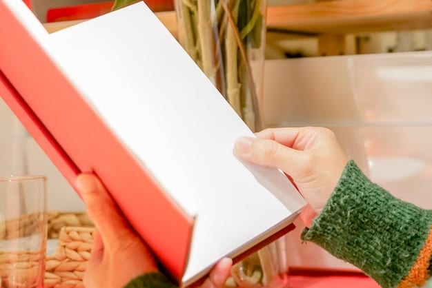 A close-up shot of a hand carefully organizing a stack of paper coupons. The background is blurred, suggesting a busy shopping environment.