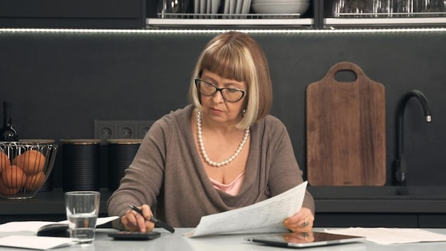 A teacher is reading a document labeled 