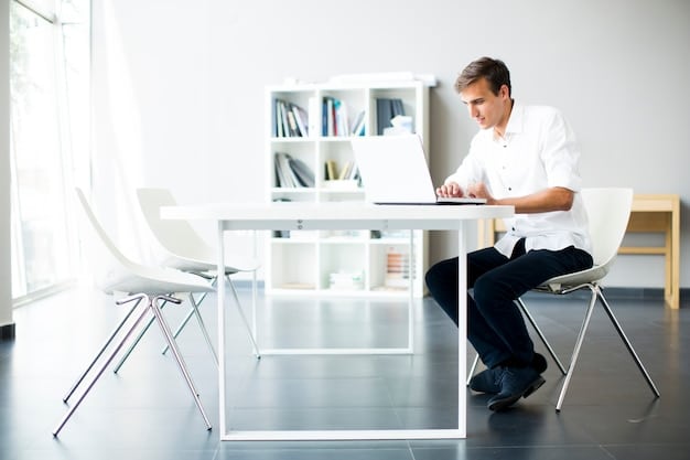 A person using a laptop in a bright, modern office space, focused on the HealthCare.gov website. The screen shows the application form for the Premium Tax Credit, with fields for income and household information. The setting connotes a sense of productivity and online accessibility.