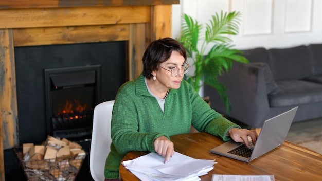 A homeowner reviewing documents and receipts related to energy-efficient home improvements at a desk, with a computer in the background showing the IRS website.