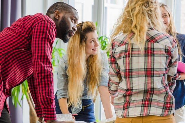 A diverse group of high school students actively participating in a debate club, showcasing teamwork, critical thinking, and engagement in extracurricular activities relevant for college applications.