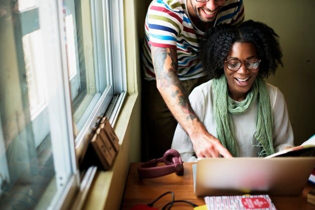 A diverse group of young adults engaged in different learning environments – some in a classroom, some working on a trade, some studying online, symbolizing diverse pathways.