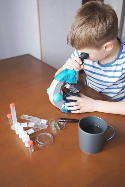 A young boy engrossed in a science experiment at home, surrounded by household objects and a lab kit, demonstrating hands-on learning.