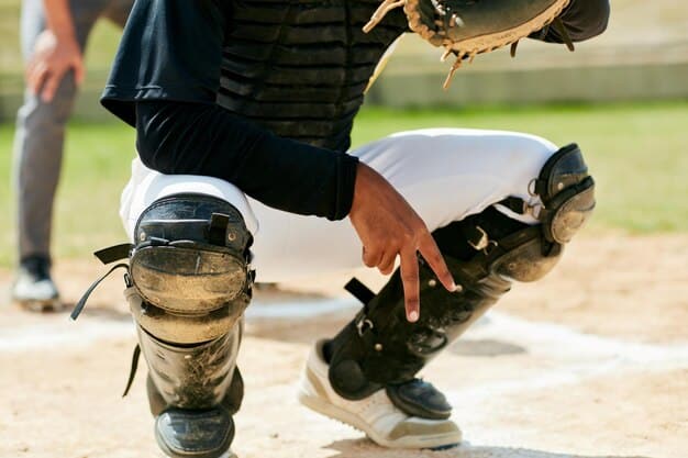 A baseball player stealing second base, with a defensive shift clearly visible, and a large base bag, illustrating changes in defensive alignment and base size.