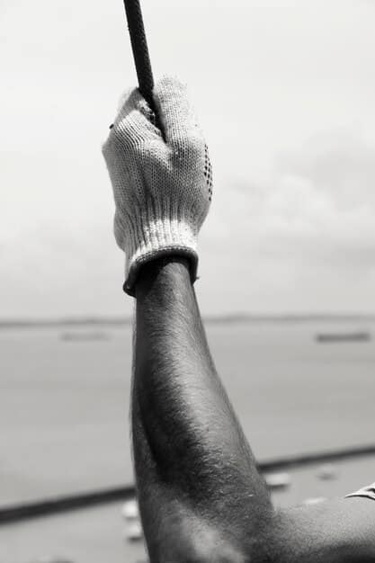 A detailed close-up of a golfer's hand holding a putter, focusing on the precision and skill required in the game.