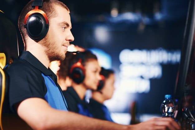 Esports athletes competing in a clean, brightly lit professional gaming arena, their faces illuminated by screens, focusing intently with high-tech headsets.