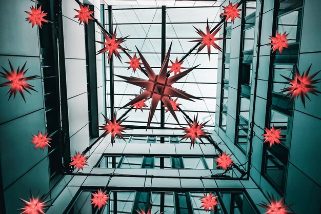 A visual representation of a corporate network under attack, with red lines indicating malicious activity emanating from multiple sources, against a backdrop of US business buildings.