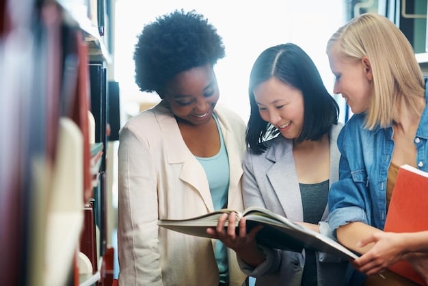 A diverse group of young adults, some holding textbooks, engaged in a study group session inside a modern university library, representing collaboration and academic support.