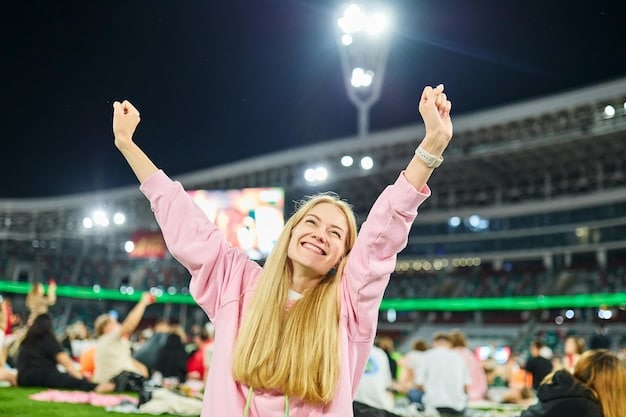 A vibrant stadium full of cheering fans during a women's soccer match under bright lights, symbolizing the atmosphere of the 2027 Women's World Cup.