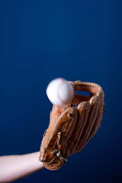 A close-up of a high-speed fastball being released from a pitcher's hand, with a blurred background of the catcher's mitt. Light is diffused to highlight the ball's trajectory. The intense focus on the ball underscores the velocity and precision involved. Relates to the increasing velocities which contributes to 'MLB Strikeouts Reach Record High: Is This Good for Baseball?'.