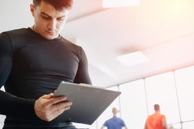 A coach reviewing AI-generated performance data on a tablet with an athlete. The data includes metrics such as speed, heart rate, and biomechanical analysis, illustrating how AI helps optimize training strategies. Showcasing New Technology: How AI is Transforming Sports Training