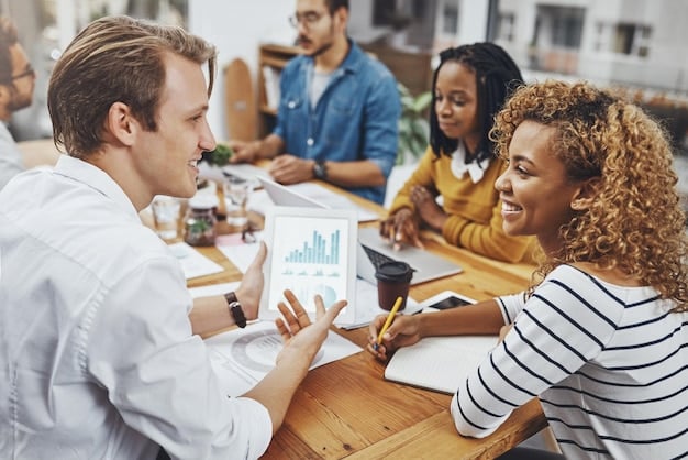 A diverse group of small business owners in a meeting, one pointing to a financial chart, indicating discussion and planning around rising costs. The setting is modern and collaborative.