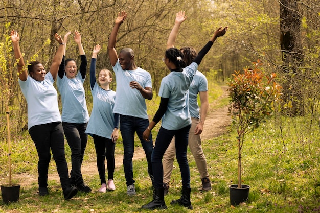 A diverse team of employees participating in a company-sponsored team-building event, demonstrating strong camaraderie and positive organizational culture.