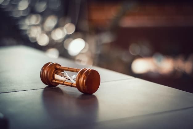 A gavel striking a sound block in a courtroom setting, symbolizing the enforcement of financial regulations and the importance of compliance in the US financial system. The background is blurred to focus on the gavel and sound block. A stack of law books is subtly visible in the background.
