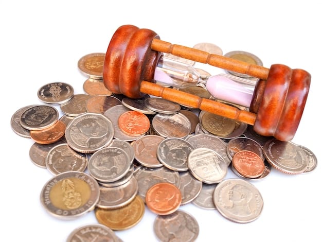 An image depicting a gavel striking down on a stack of coins, symbolizing the financial impact of US sanctions. The background should be blurred to emphasize the gavel and coins, representing authority and economic consequences. Mention US Sanctions: Evaluating the Effectiveness of Economic Measures Against Foreign Nations.